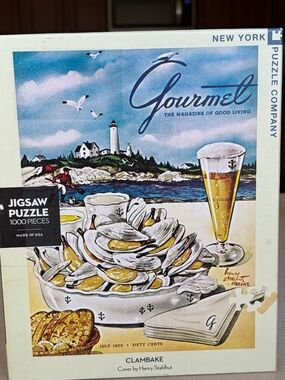 New York Puzzle Company 1000 Piece Jigsaw Puzzle  Titled "CLAMBAKE"